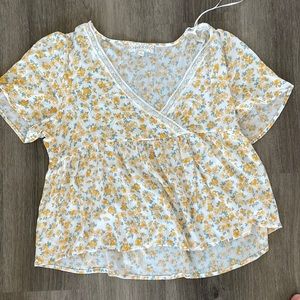 Cutest floral light blouse! Perfect with jeans for a picnic or a fun day out :)